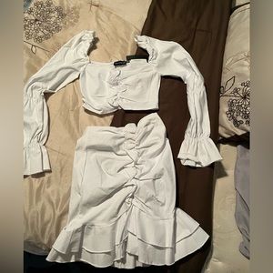 Two piece, long sleeve skirt and crop top